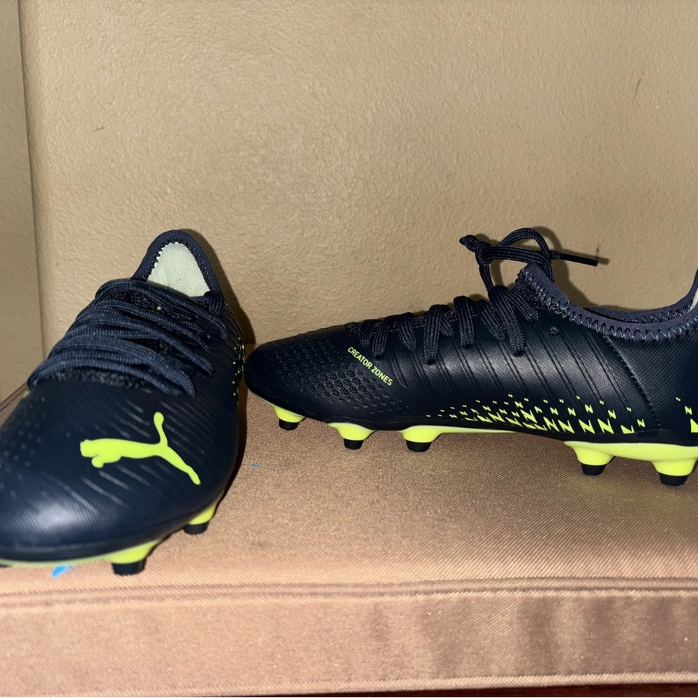 Brand New Never Worn Puma Youth Black and Yellow Soccer Cleats